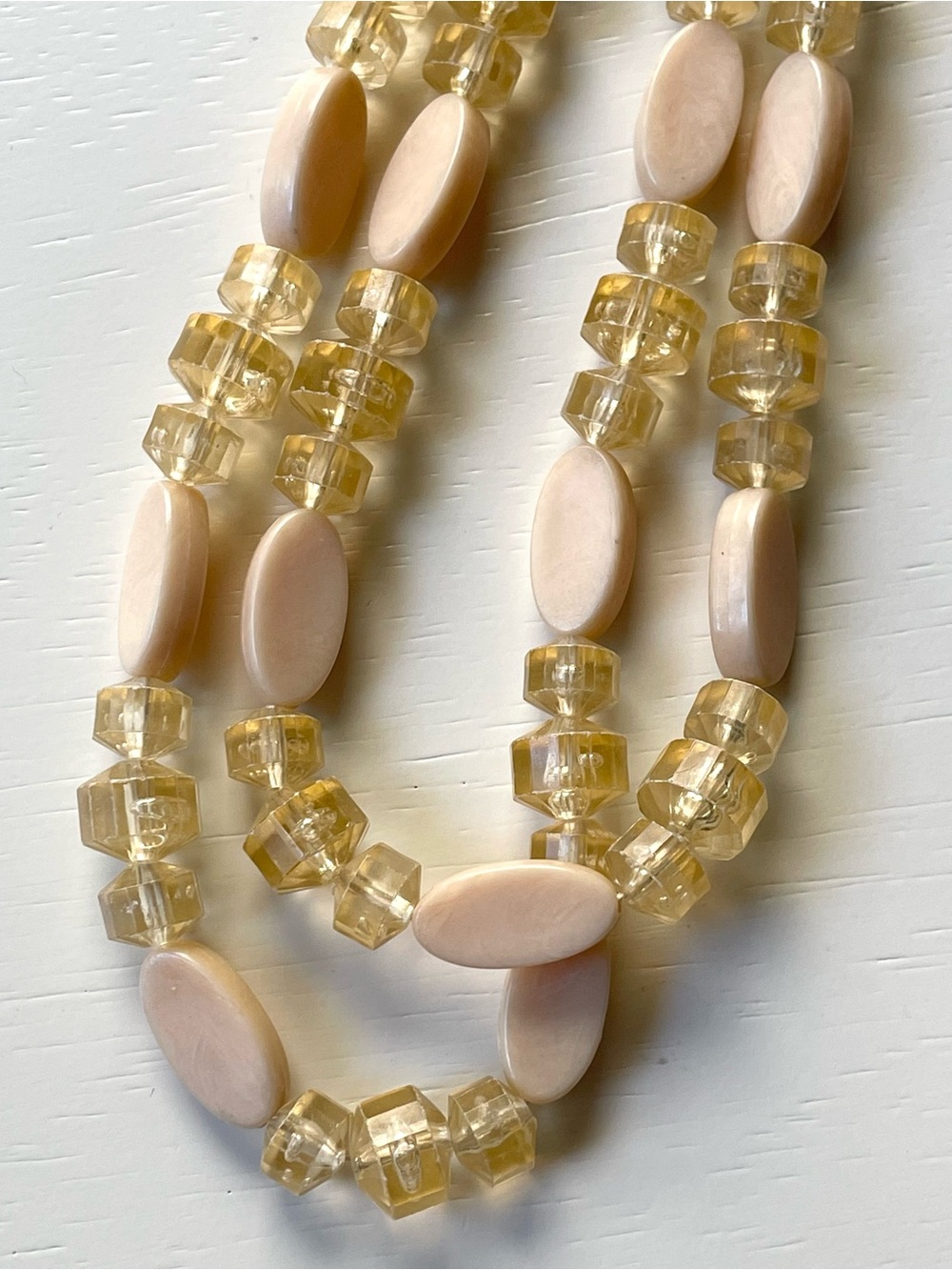 Vintage Hong Kong peachy plastic beaded double strand choker necklace glows